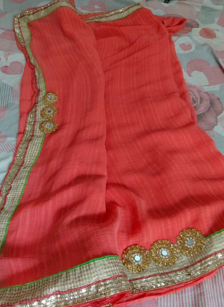 Beautiful Orange/coral Saree with Golden Border