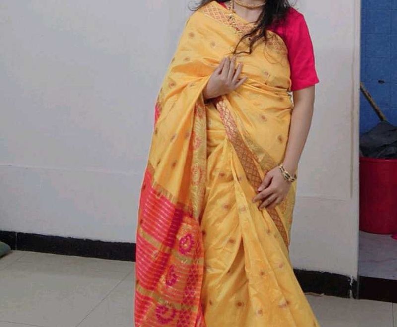 Elegant Yellow Silk Saree with Pink Border
