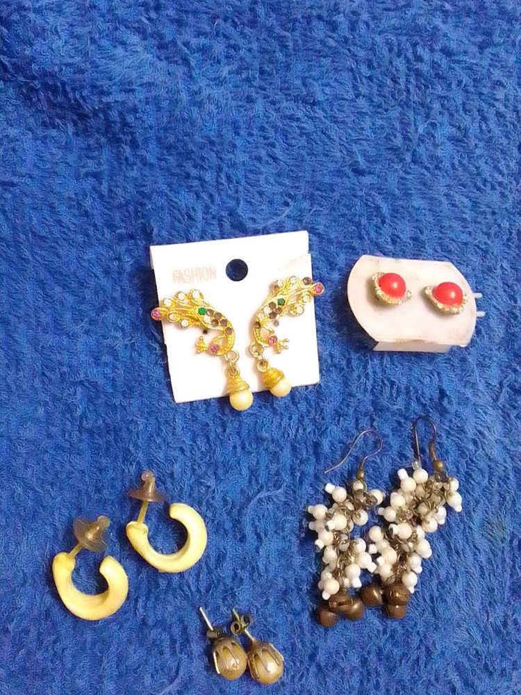 Set Of 7 Earrings, pendant and chain