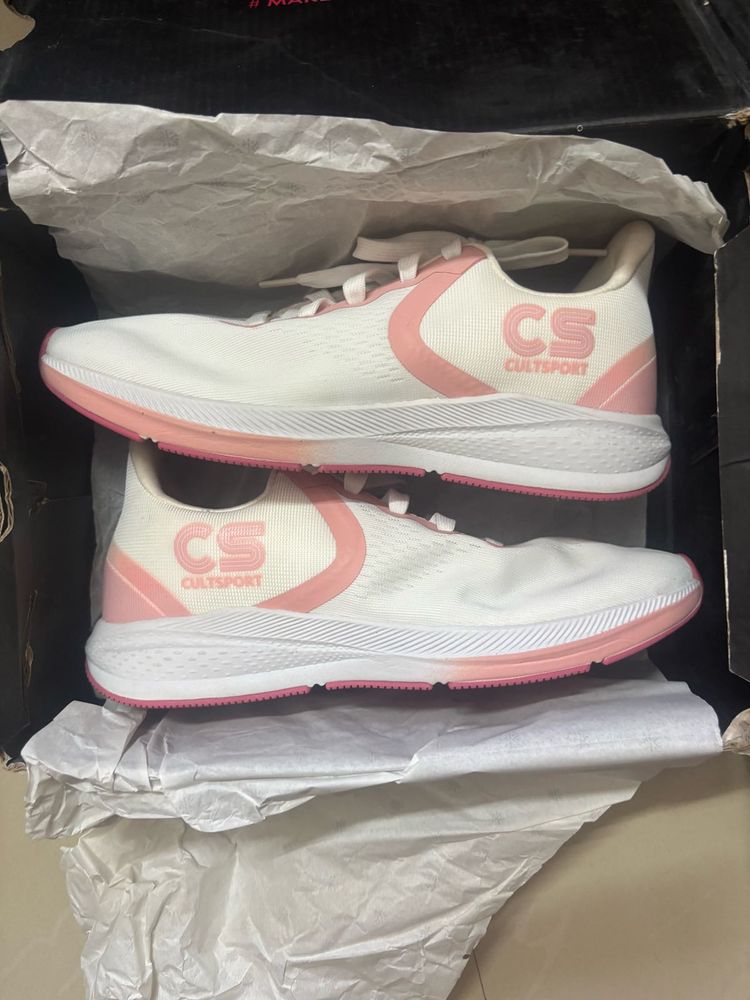 White and Pink Sports Shoes