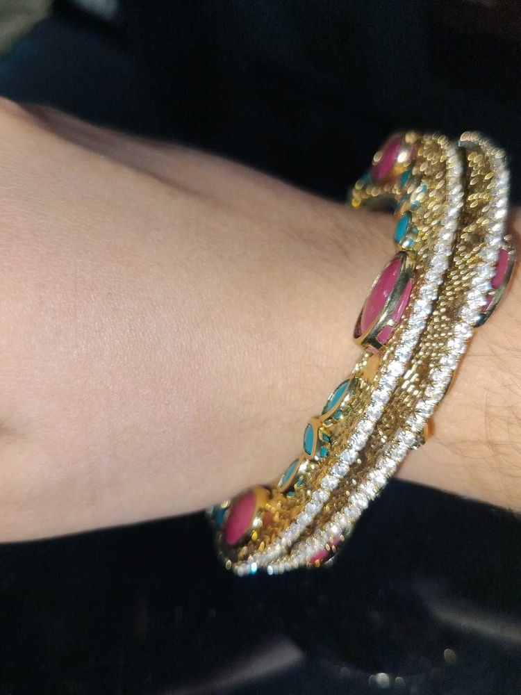 Exquisite Gold Bangle with Stones