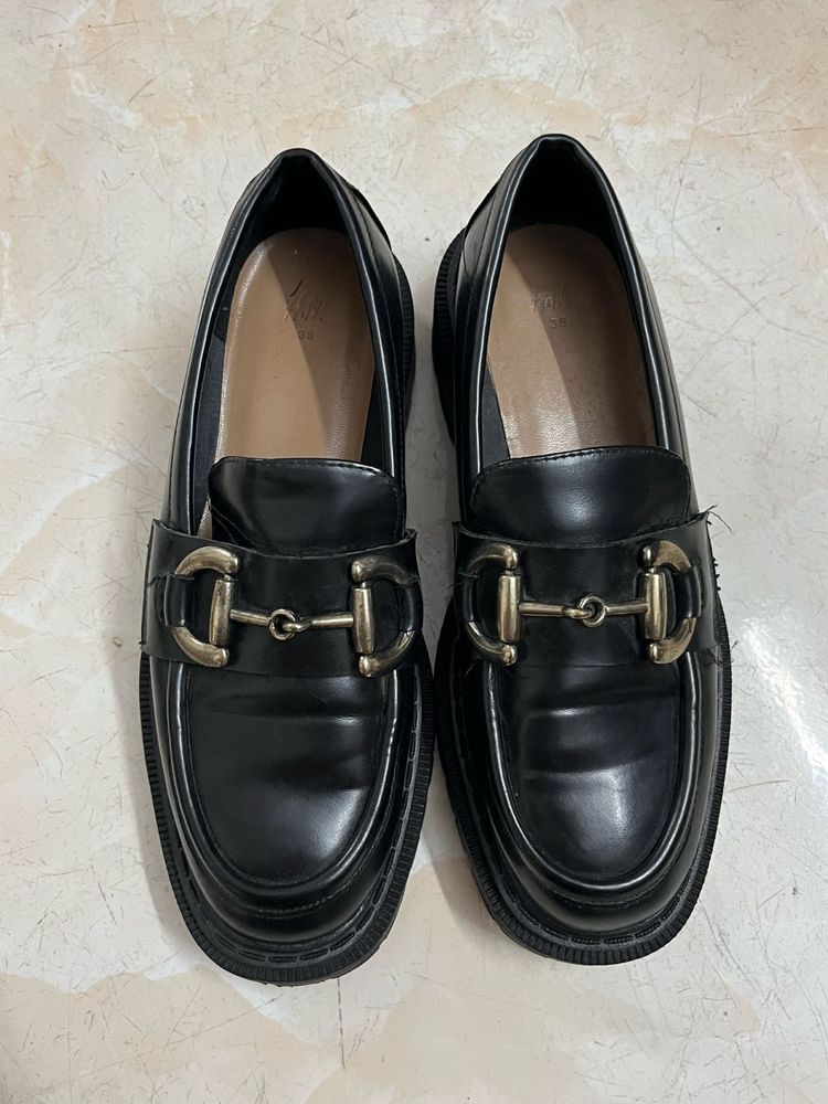 Classic Black Loafers with Gold Buckle