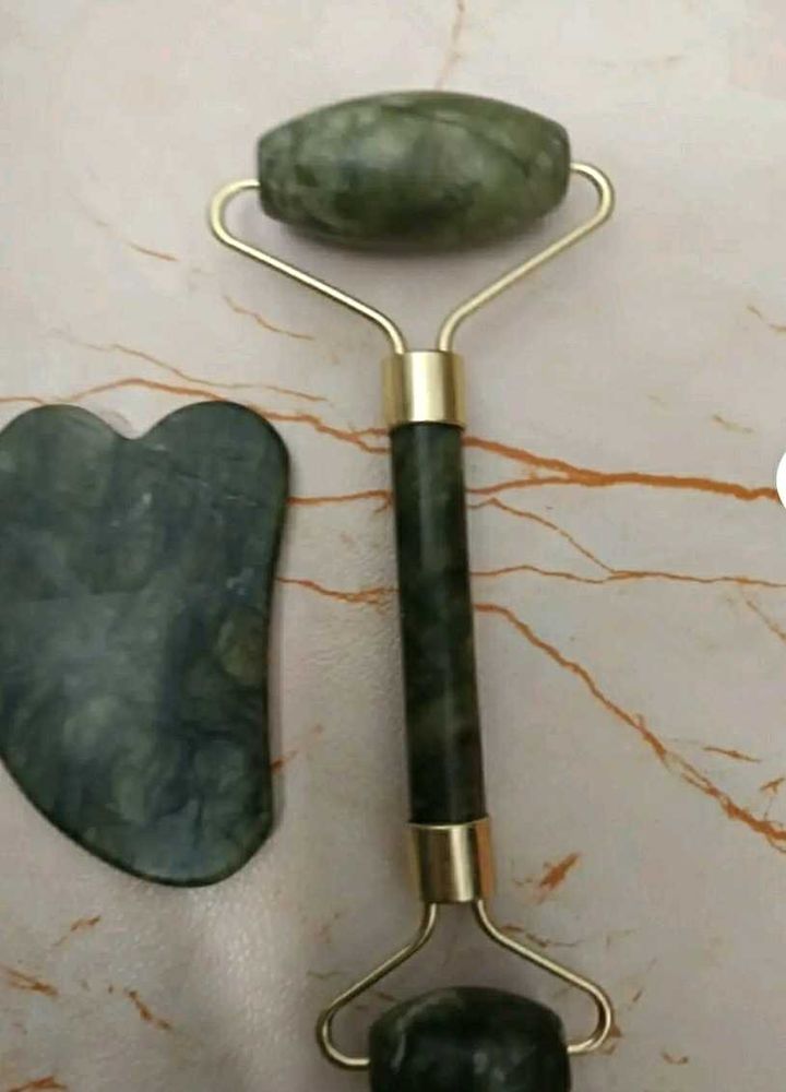 gua sha , jade roller and a head massager