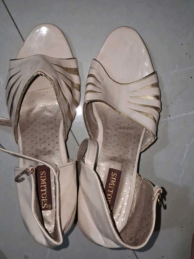 Elegant Cream Wedge Heels with Gold Accents