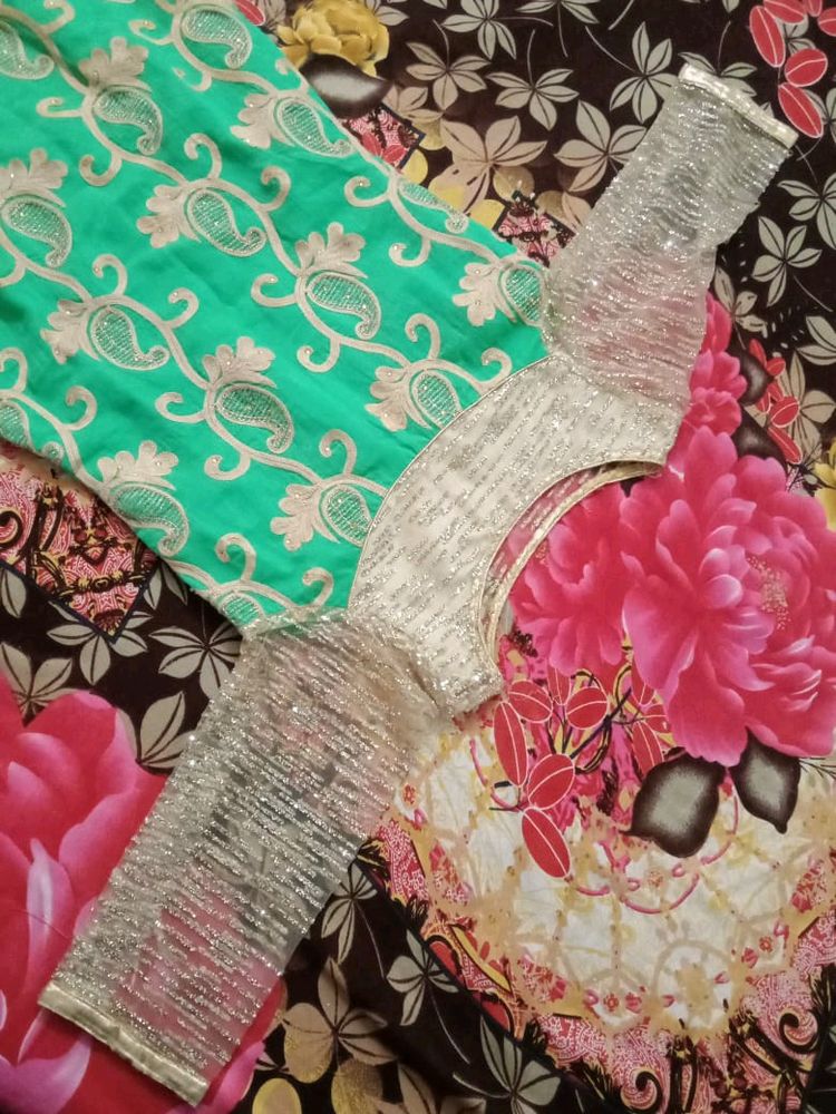 Green Ethenic Suit For Celebrations