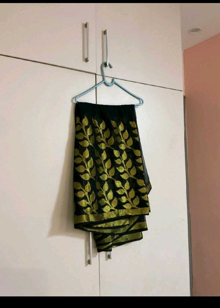 Elegant Black Saree with Golden Leaf Print