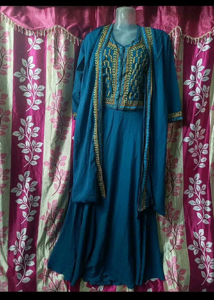 Elegant Teal Gown with Gold Embroidery