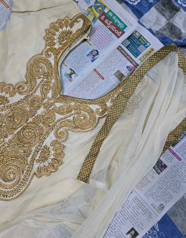 Heavy Work Cream Anarkali Set with Gold Embroidery