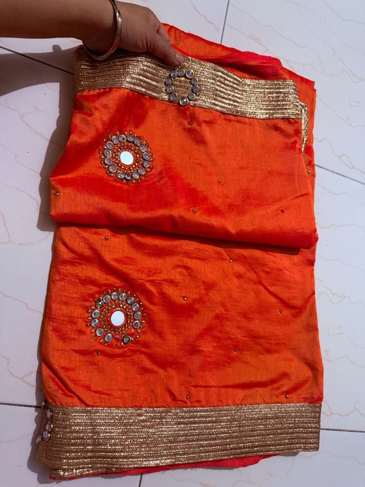 Vibrant Orange Saree with Embellishments