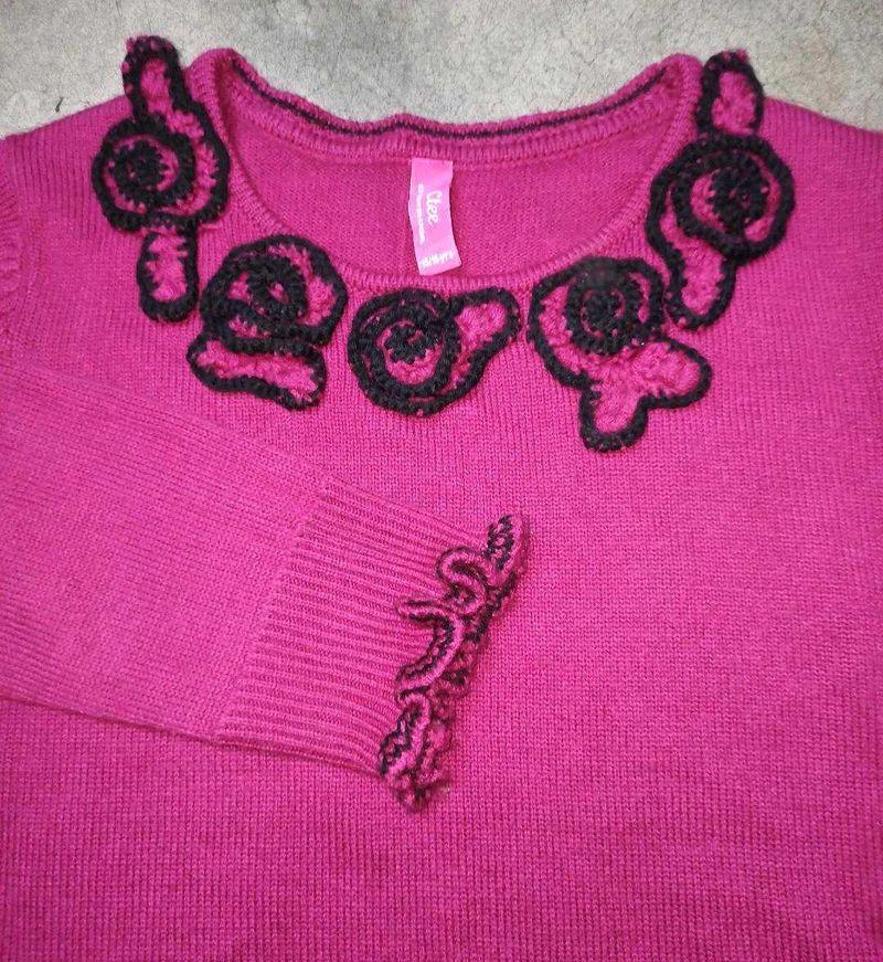 Pink Knit Sweater with Black Embellishments