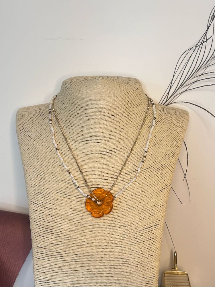beaded gold and pearl beads with flower pendant