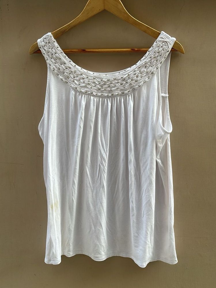 White Sleeveless Top with Embellished Neckline