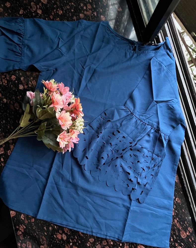 Blue top with cut work sleeves