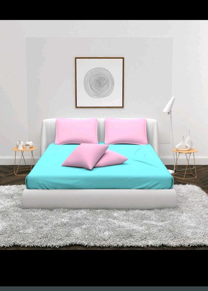 Turquoise Bed Sheet Set with Pink Pillows
