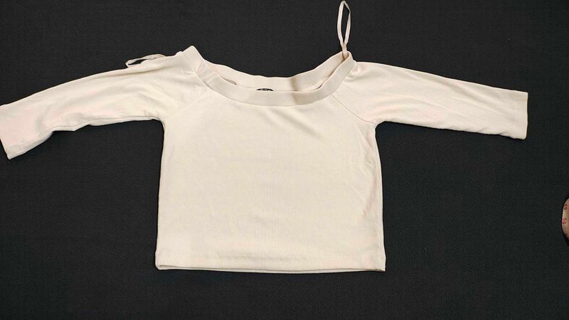 Off-white Short Top For Casual Wear.