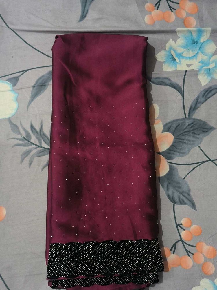 Elegant Maroon Saree with Embellishments