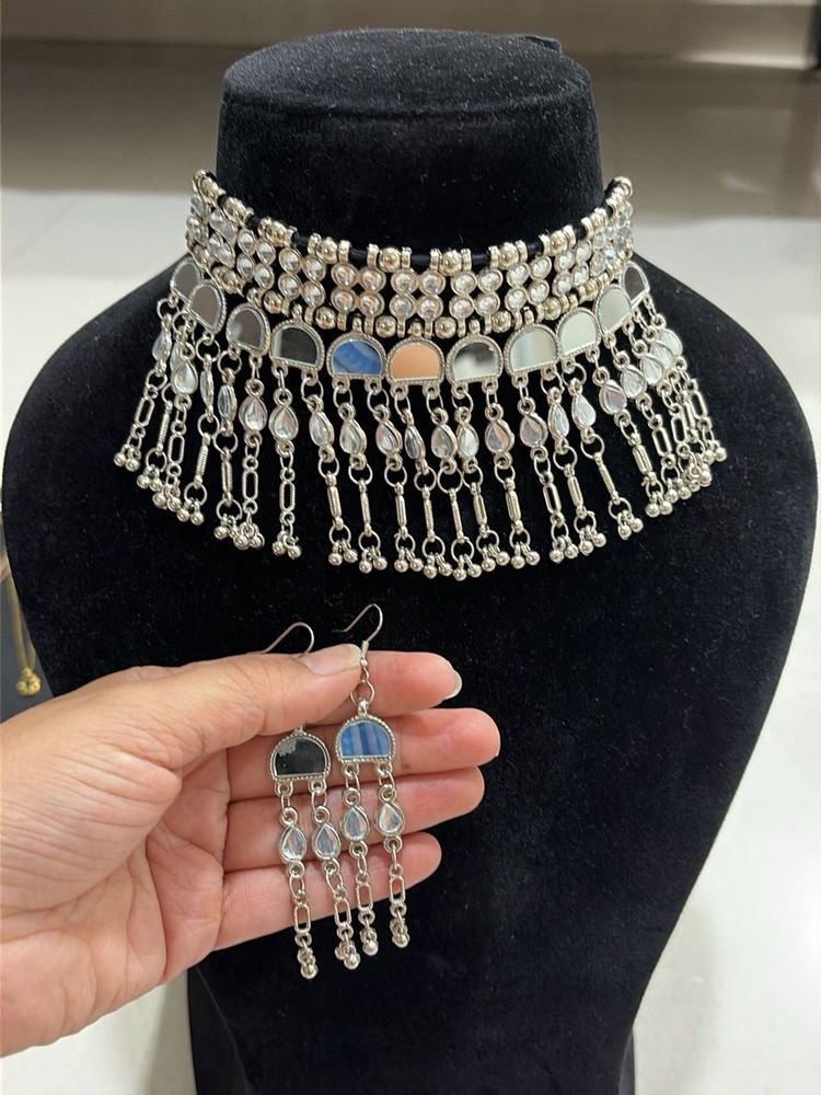 Brand new. Extremely lightweight. Boho Mirror Chok