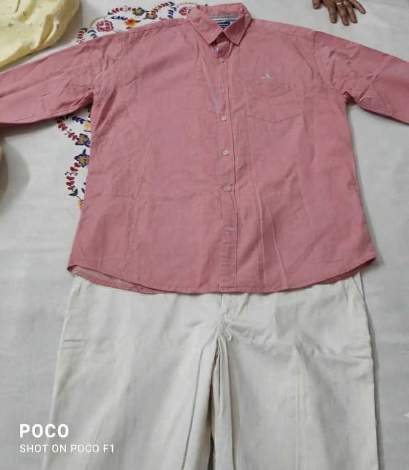 Men's Pink Button-Down Shirt with jeans