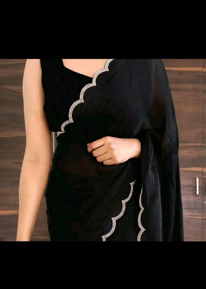 Elegant Black Saree with Scalloped Edges
