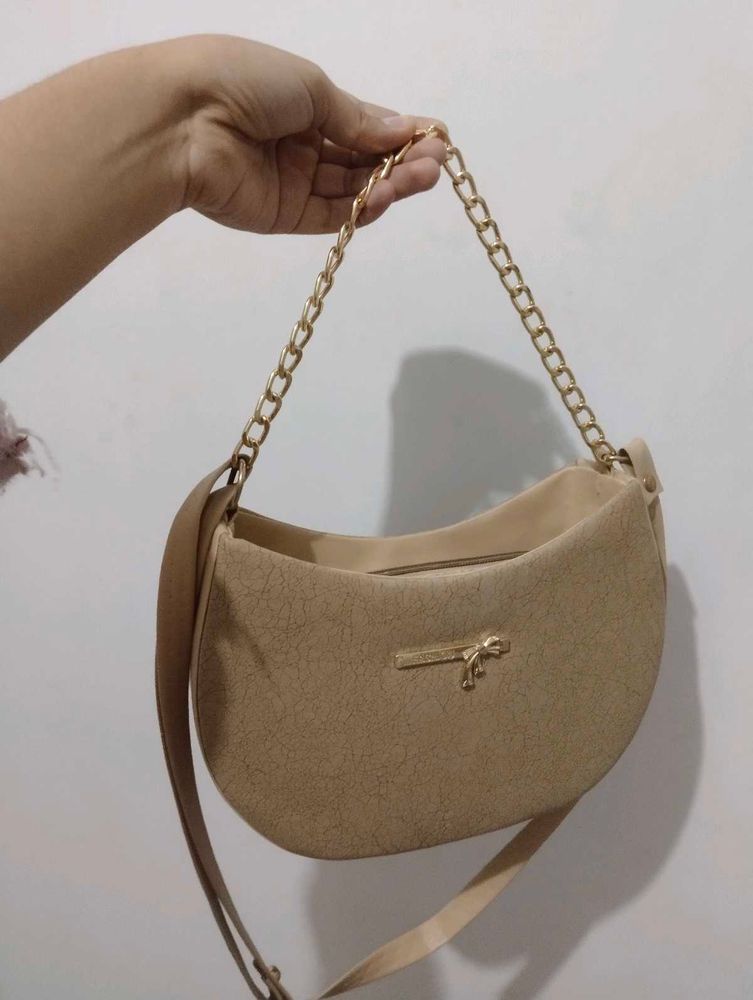 Stylish Beige Hobo Bag with Gold Chain