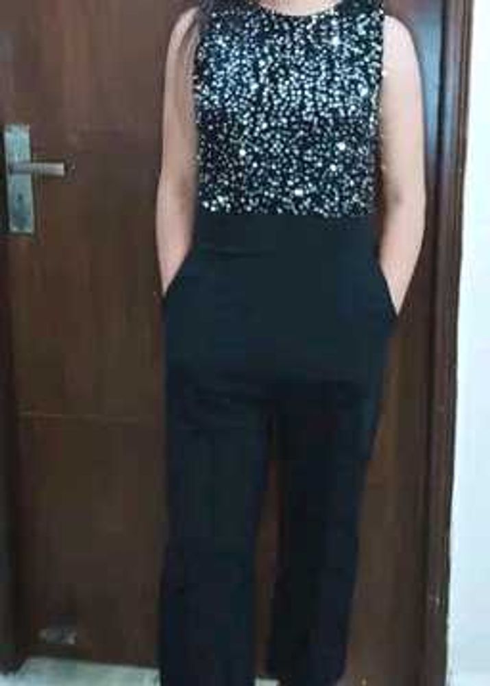 Black sequence jumpsuit with pockets.✨Like new