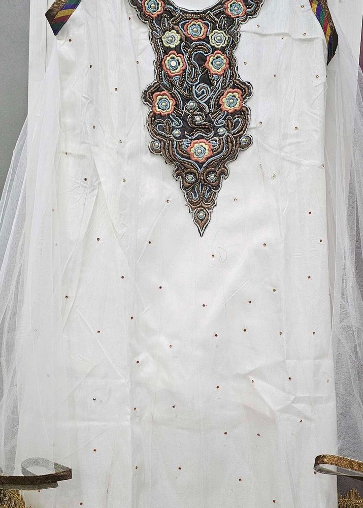 Elegant White Kurta Set with Embellished Neckline