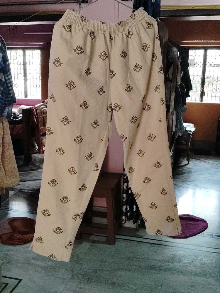 235.Cream Printed Palazzo Pants