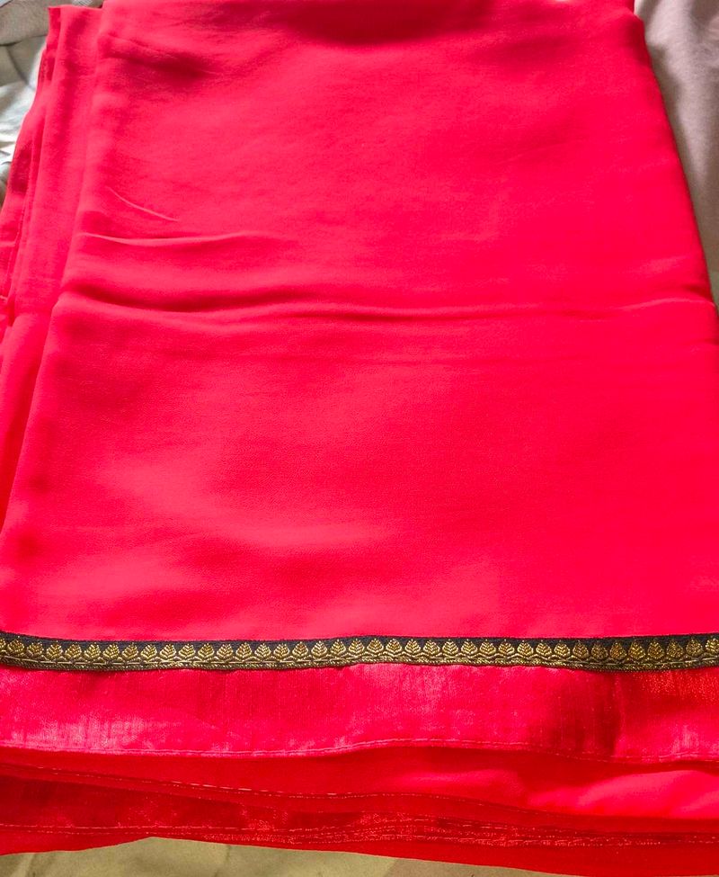 Vibrant Red Saree with Golden Border