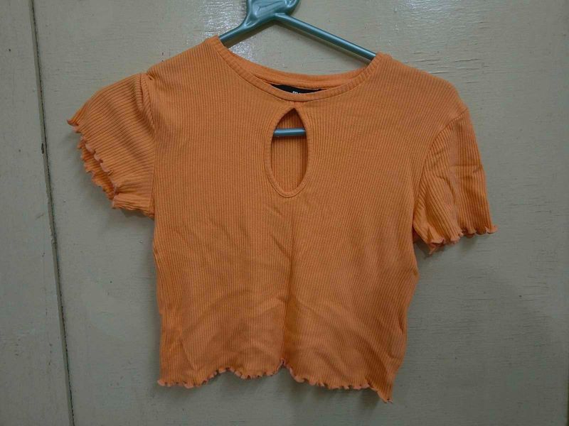 Orange Ribbed Cut-Out Cropped Top