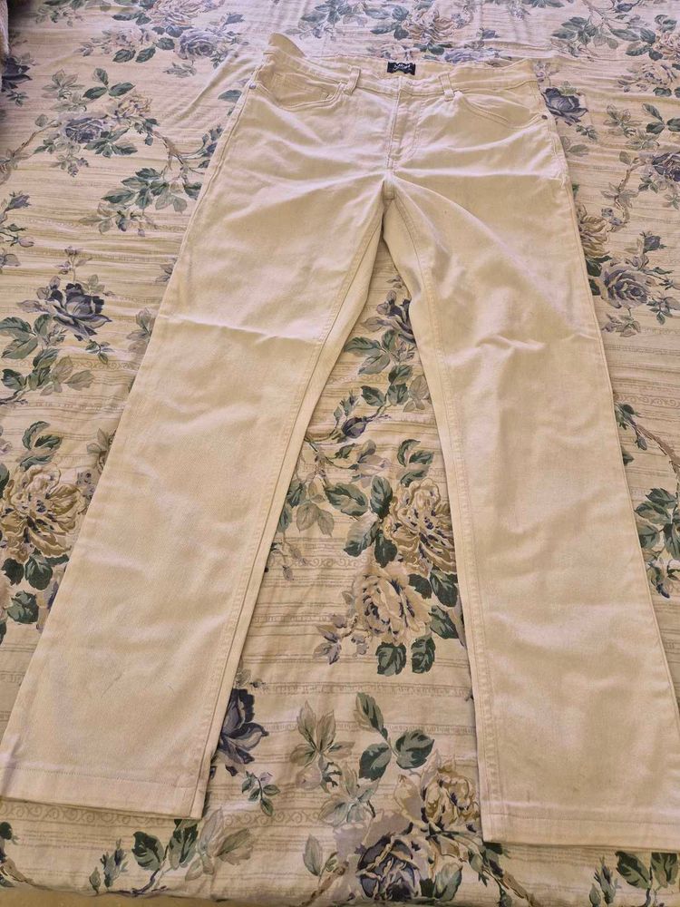 Cream Wrangler Jeans