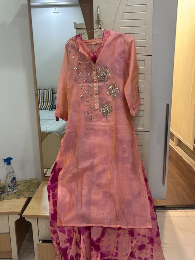Elegant Peach Embroidered Kurta with inner skirt