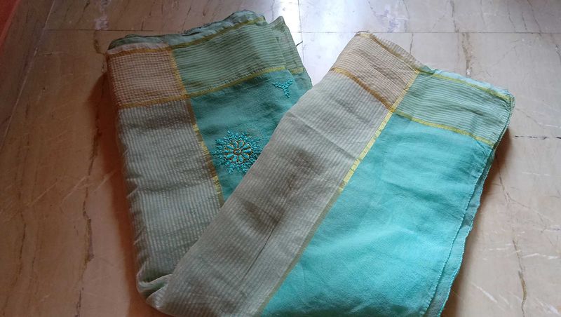 Beautiful Teal Saree with Intricate Embroidery