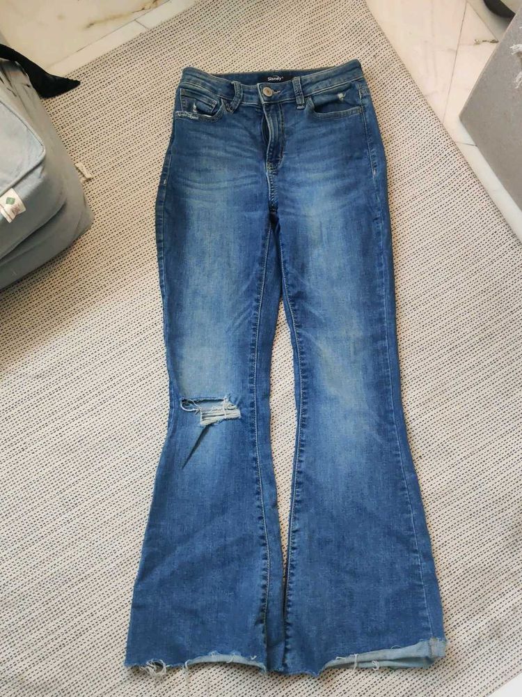 Blue Flare Jeans with Distressed Knee