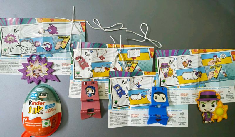 4 Different kinder joy DC accessories