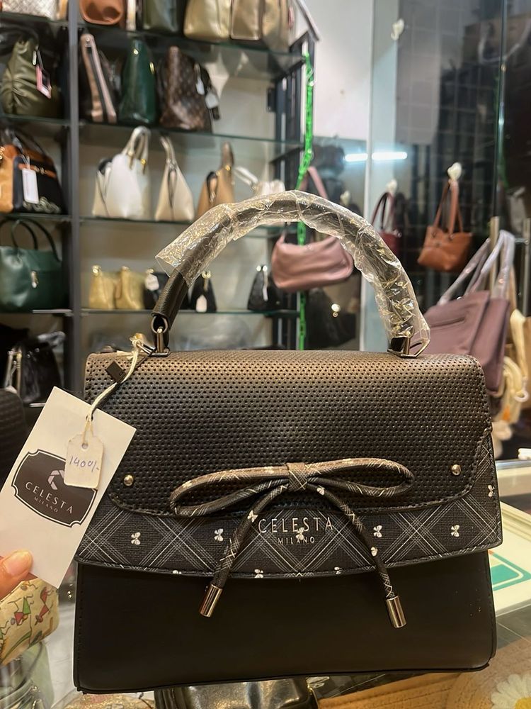 Chic Black Handbag with Bow Detail