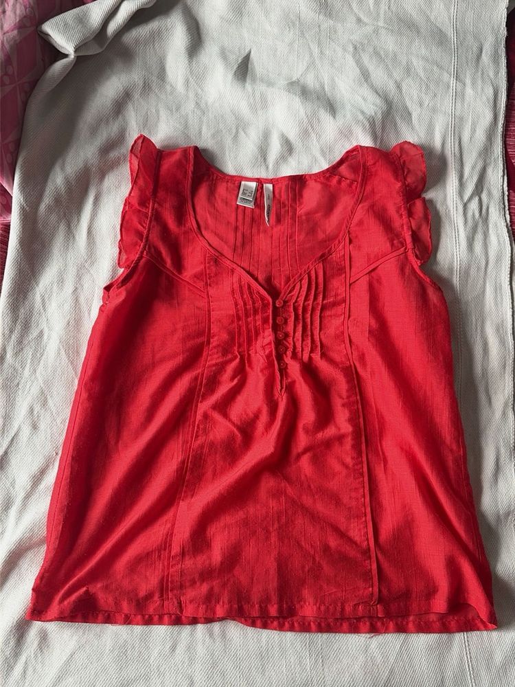 Red Sleeveless Blouse with Ruffle Sleeves