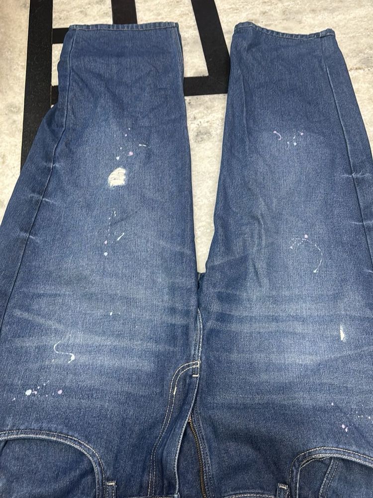 Distressed Blue Denim Jeans