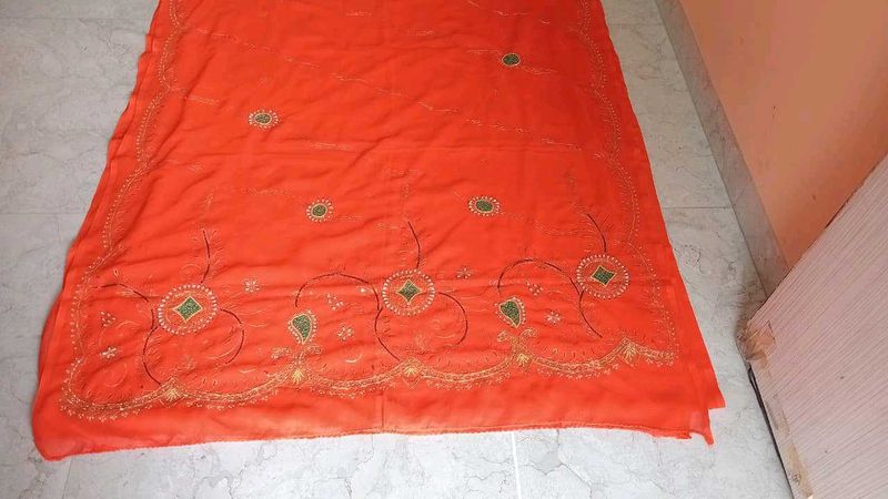 royal rajputi old time .Orange Embroidered Saree