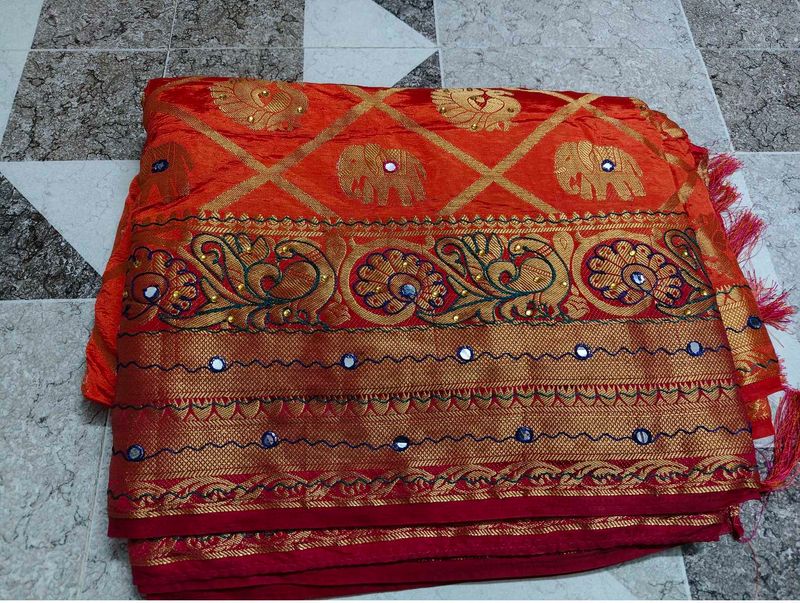 Vibrant Orange Silk Saree with Elephant Motifs