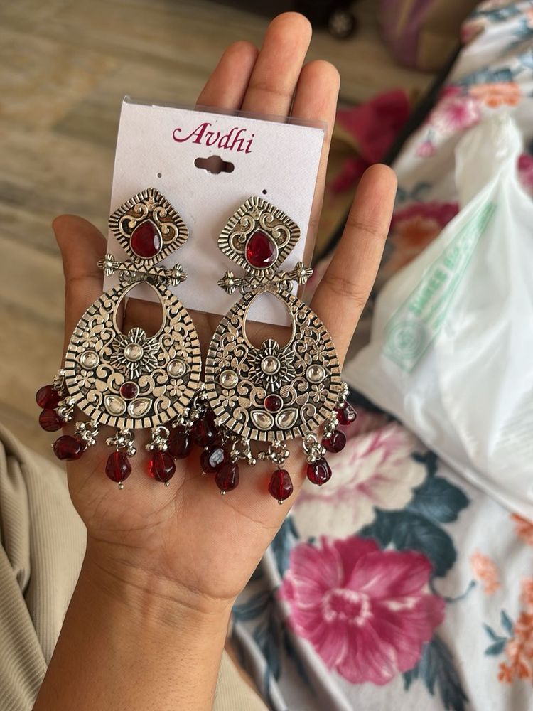 Oxidized Silver Jhumka Earrings with Red Stones