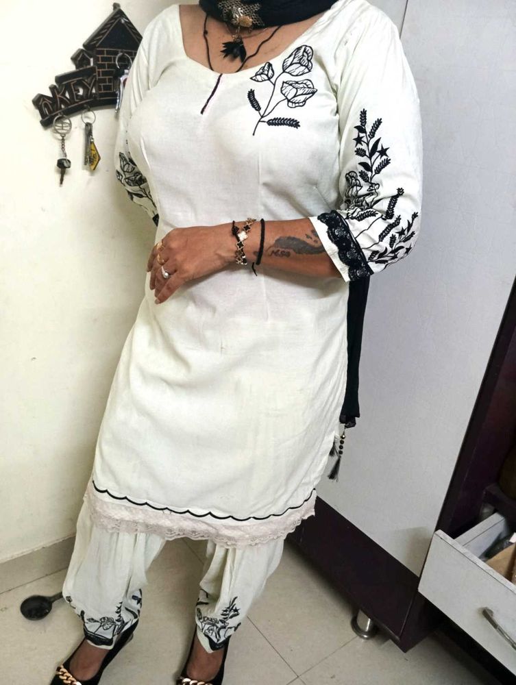 Elegant Cream Kurta Set with Black Embroidery