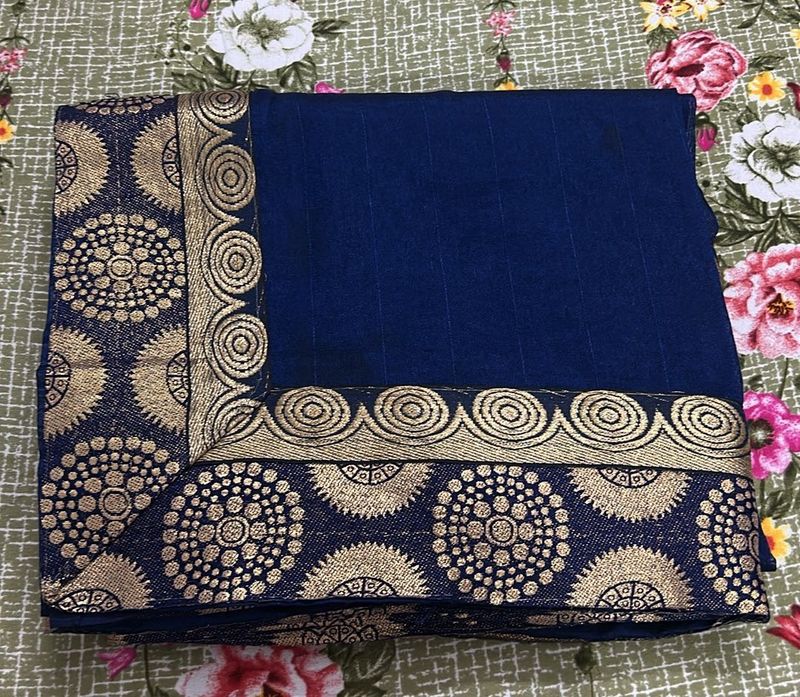 New-Elegant Blue Saree with Gold Border