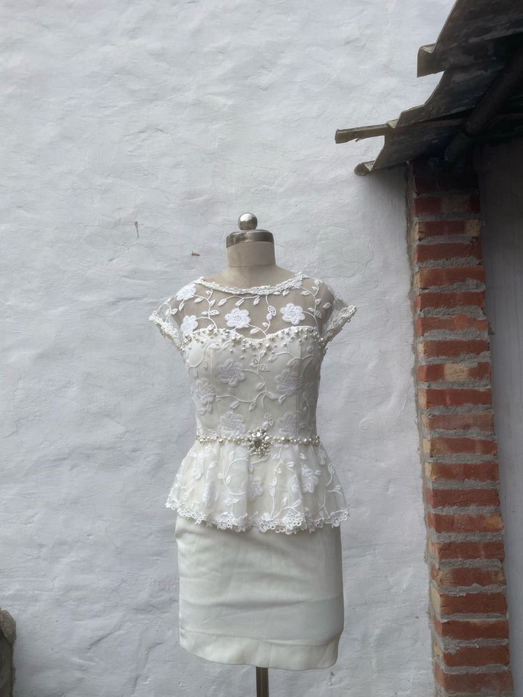 Elegant White Lace Peplum Gown