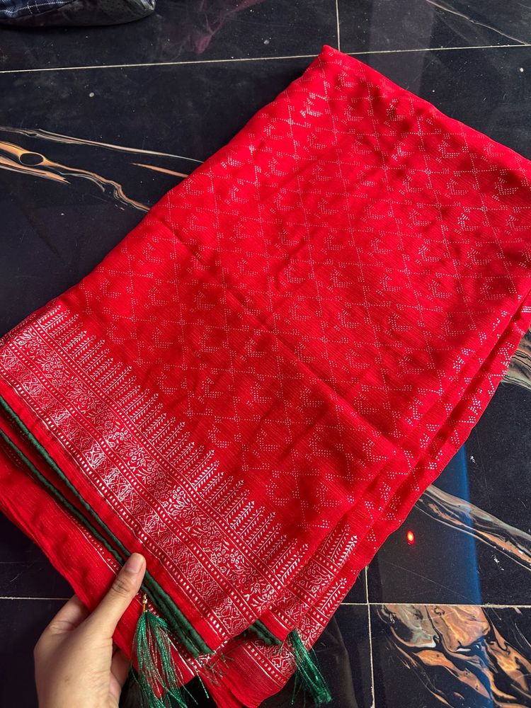 Vibrant Red Saree with Intricate Silver Weave