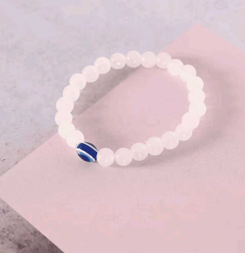 White Bead Bracelet with Blue Evil Eye Charm