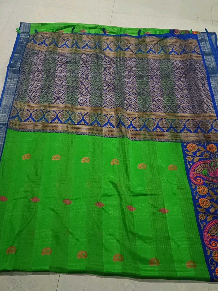Vibrant Green Silk Saree with Blue Border