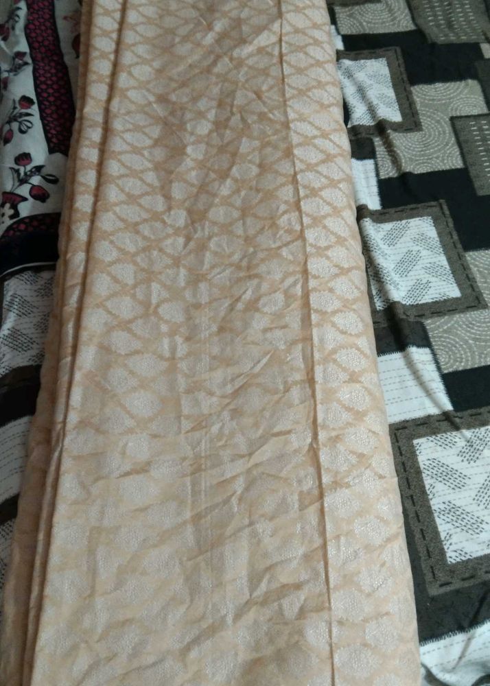Elegant Peach Saree with Intricate Weave