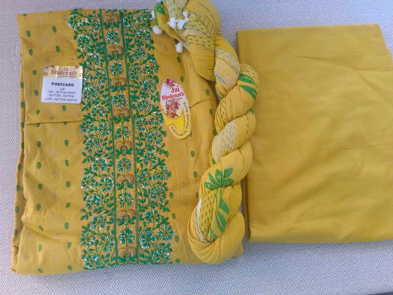 Yellow Cotton dress material with Green Embroidery