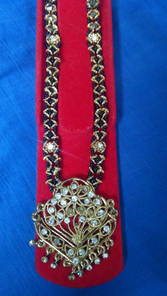 Black and golden long pendant chain
