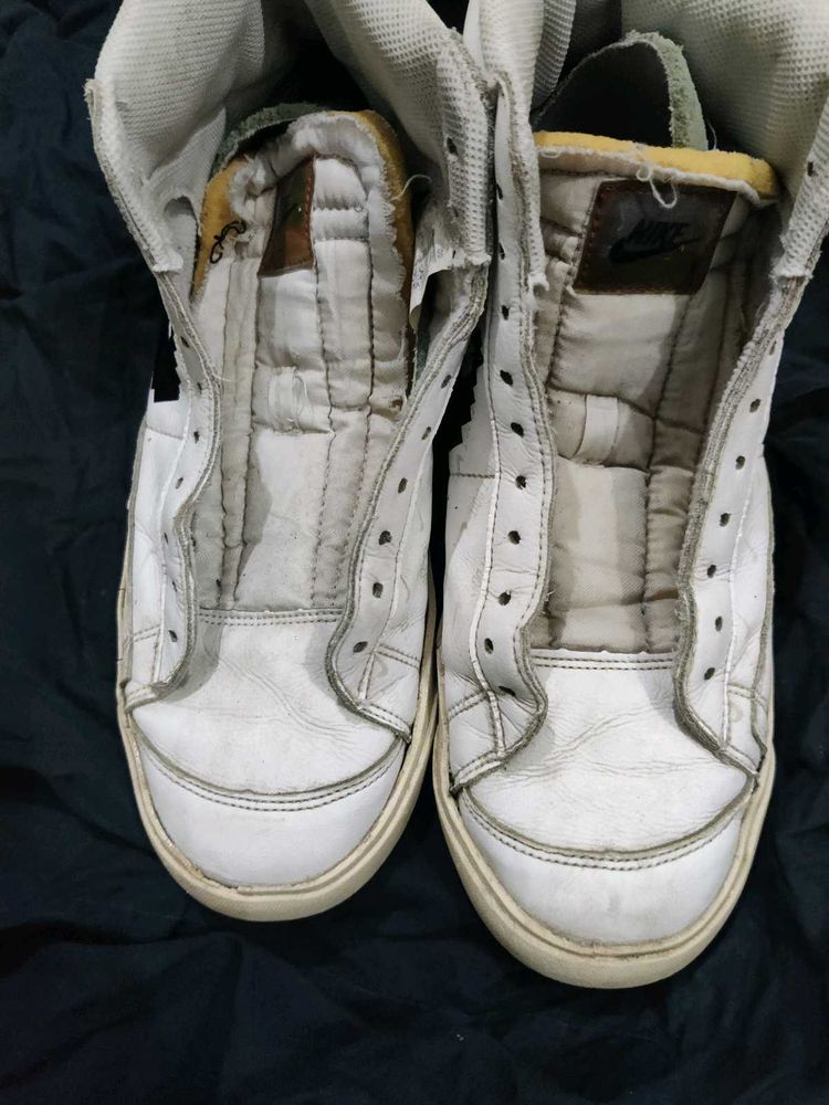 Nike Worn White High-Top Sneakers